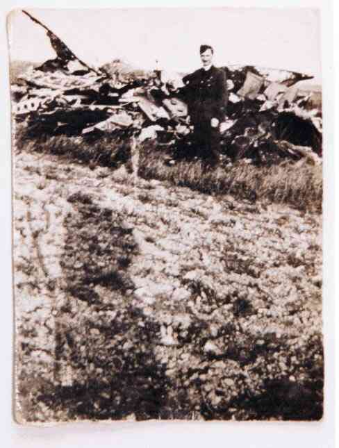 Harry standing by the remains of Lancaster WP-H